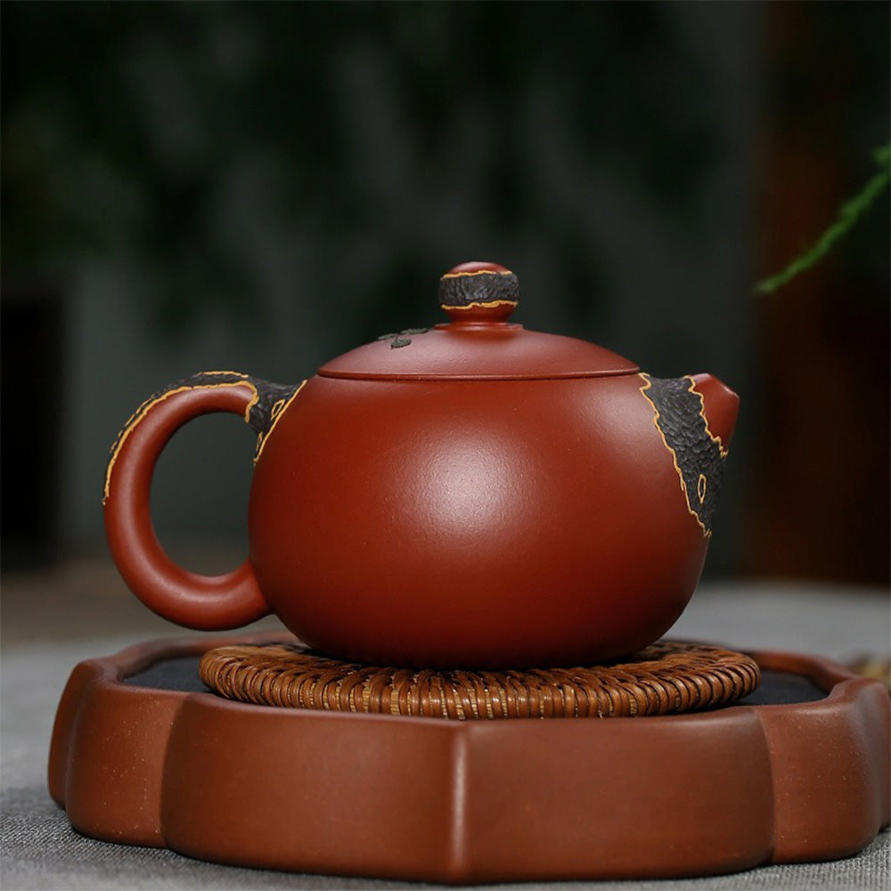 Yixing Da Hong Pao teapot from a side angle, highlighting its smooth finish and craftsmanship.