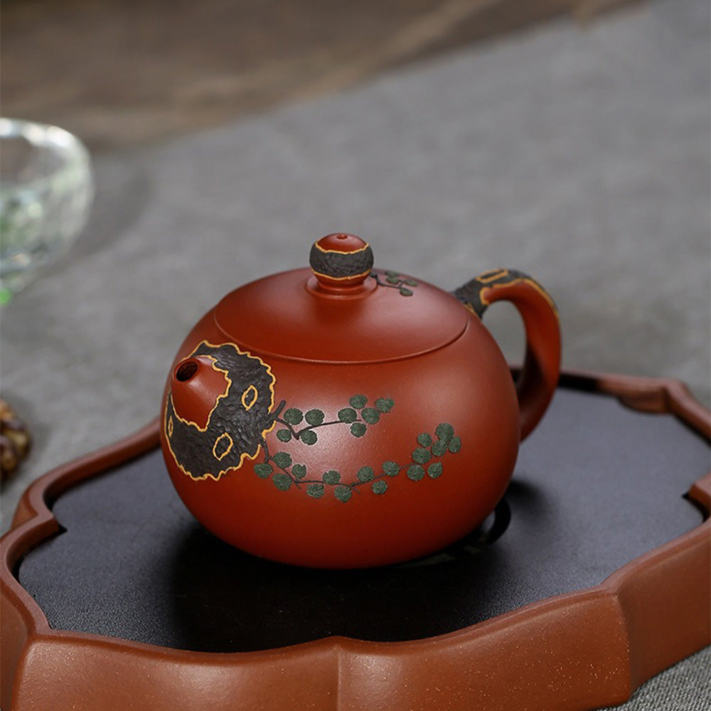 Yixing Da Hong Pao teapot in use, filled with steaming tea, showcasing its functionality and beauty.