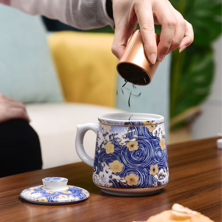 Elegant Chinese Sea Wave Porcelain Tea Cup with Infuser showcasing waves and eddies design.