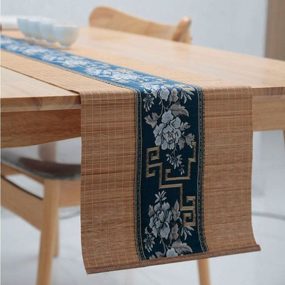 Tea setting with bamboo tea table mat, showcasing its elegant design