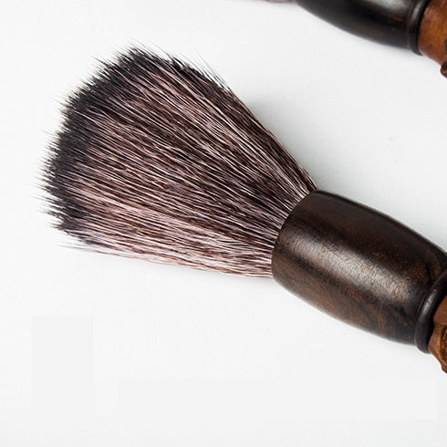 Eco-friendly teapot cleaning brush in action, demonstrating its effectiveness at cleaning hard-to-reach areas.