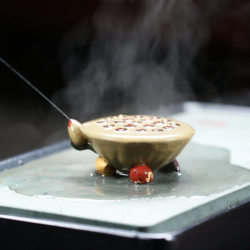 Close-up of the Yixing clay tea pet with a glossy finish, ideal for tea lovers collection