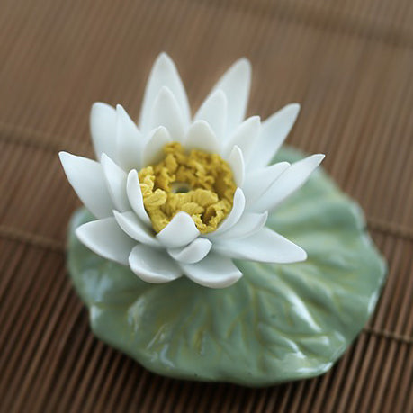 Porcelain tea pet with glossy finish and floral design, perfect for gifting