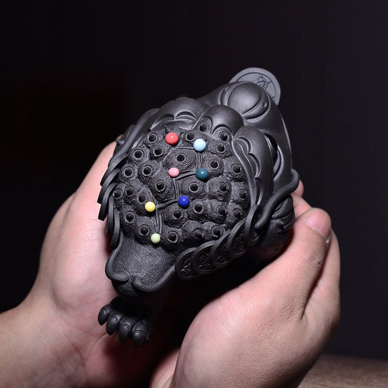 Beautifully glazed Yixing clay toad tea pet with a glossy surface, ideal for tea lovers