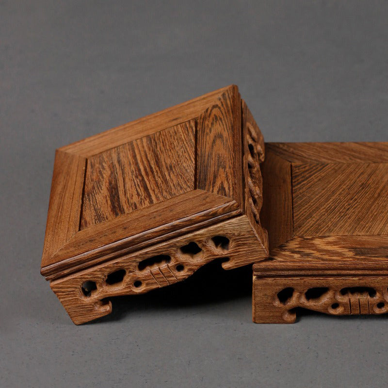 Close-up of wenge wood teapot stand showing natural grain and smooth finish
