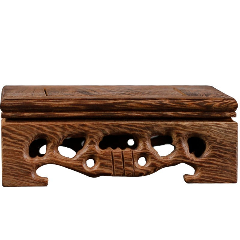 Close-up of wenge wood teapot stand showing natural grain and smooth finish