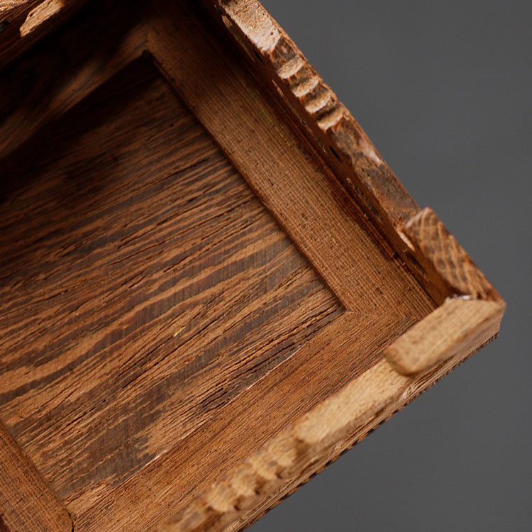 Side angle of the teapot stand highlighting its artistic stripes and compact size
