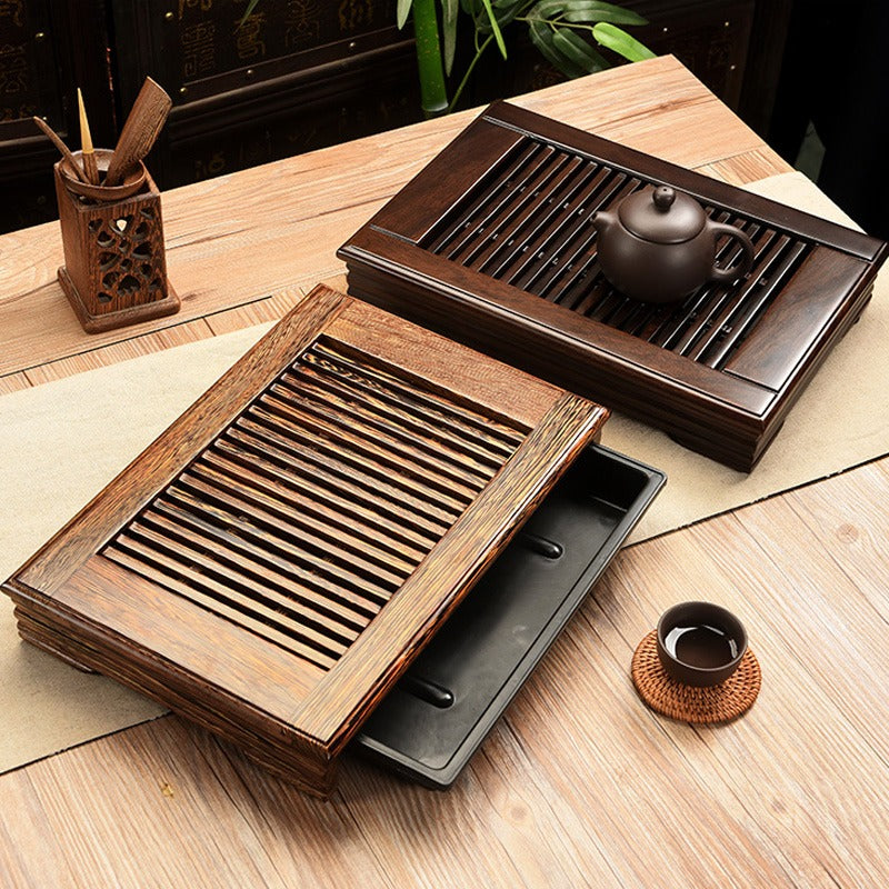 Tea set arranged on an elegant gongfu tea tray during a tea ceremony