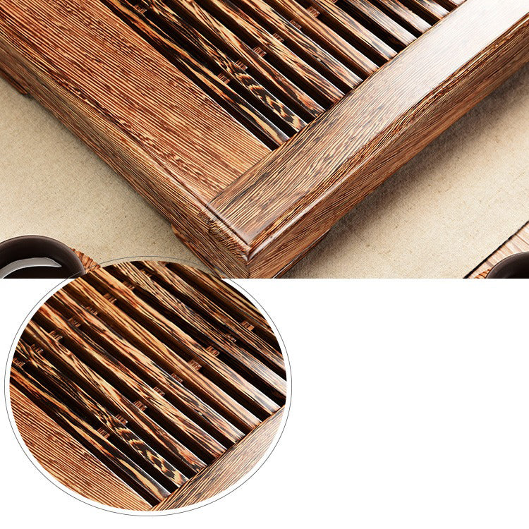 Side view of the Panga-Panga wood tea tray highlighting its size and design