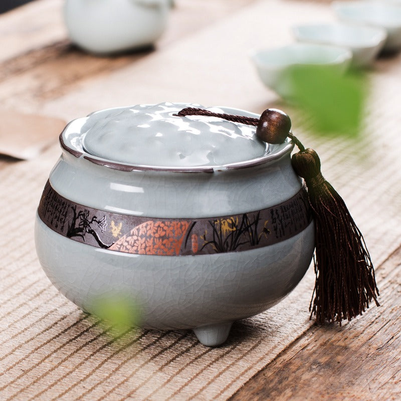 Angled view of LotusCraft tea caddy showing lotus petal contours and Ge kiln texture, perfect for tea storage