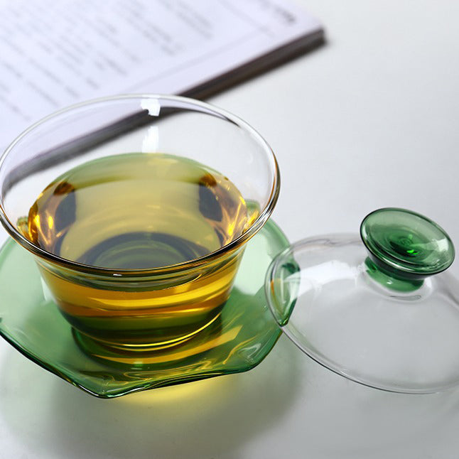 Heat-resistant glass gaiwan with tea leaves inside, showcasing clarity and elegance