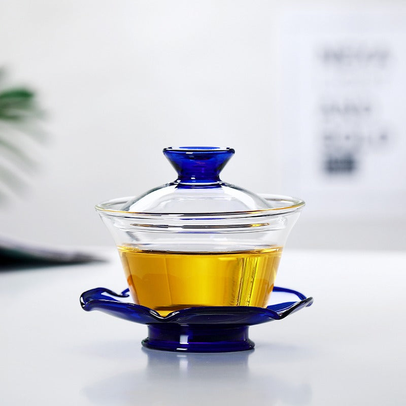 Heat-resistant glass gaiwan with tea leaves inside, showcasing clarity and elegance