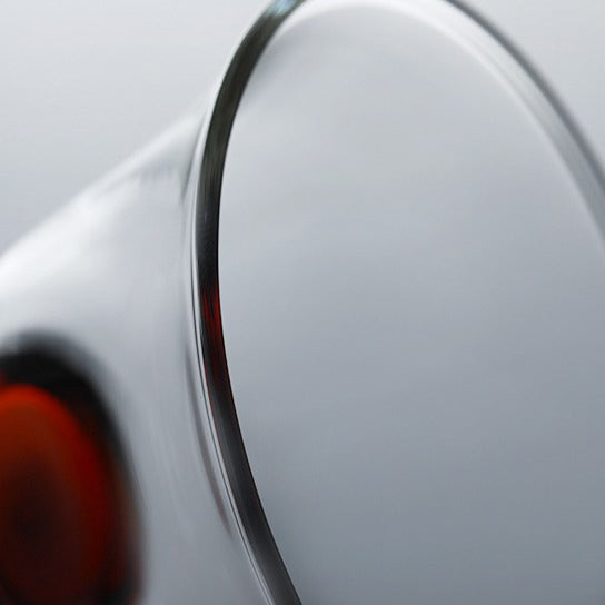 Heat-resistant glass gaiwan with tea leaves inside, showcasing clarity and elegance
