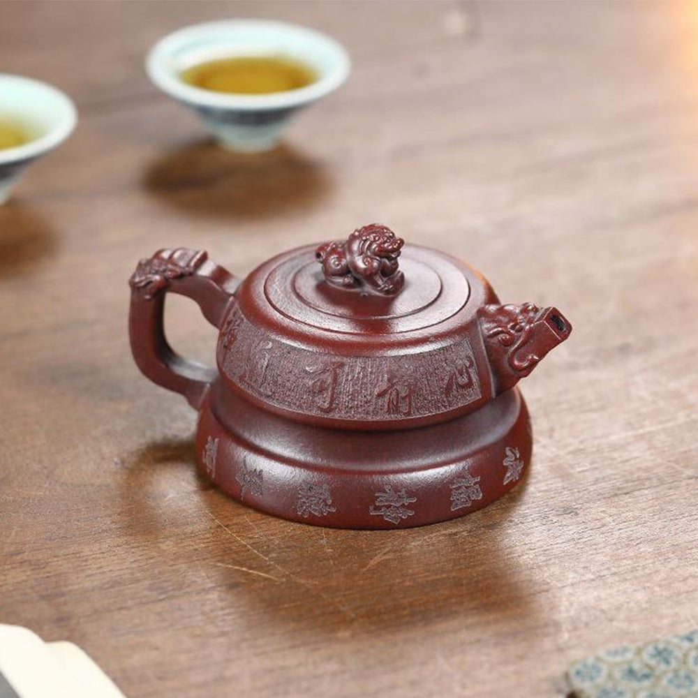 Close-up of the carved patterns and rich texture of the purple clay teapot