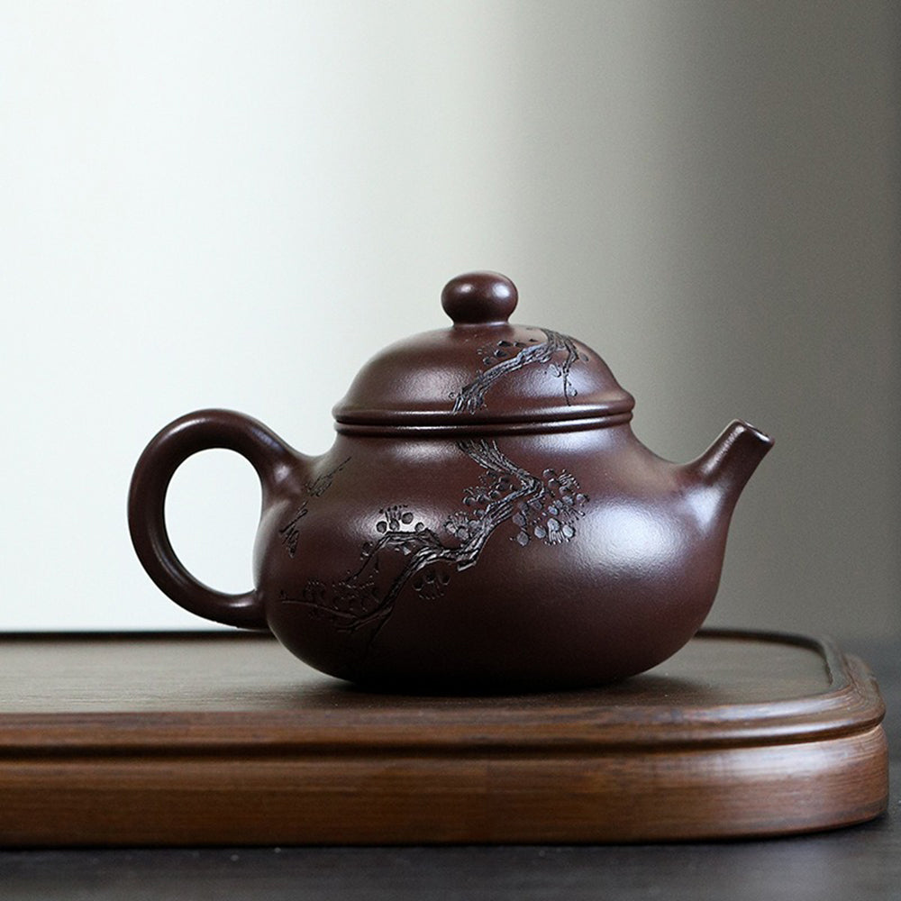 Side view showcasing the elegant shape and spout of the handmade Yixing teapot