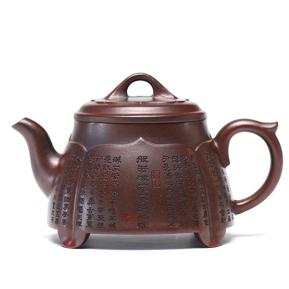 Front view of handcrafted purple clay lotus teapot with detailed carvings