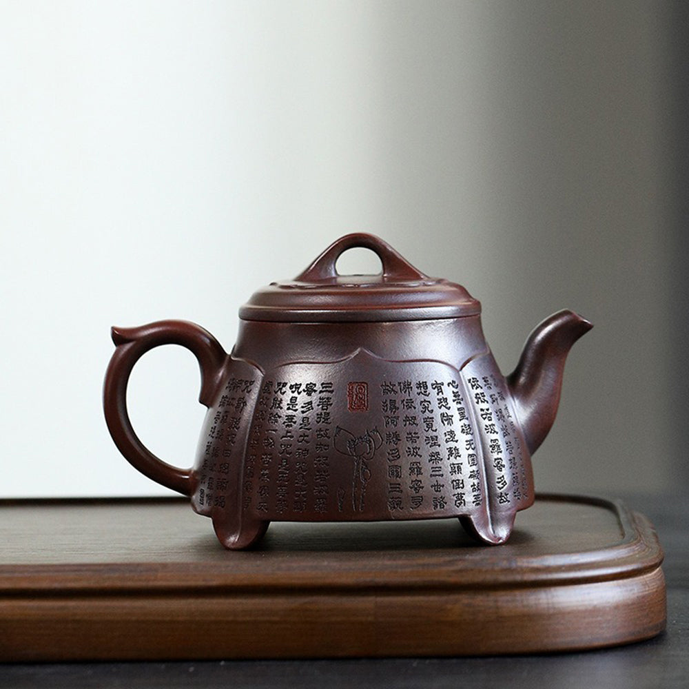 Close-up of the spout and handle of the purple clay lotus teapot