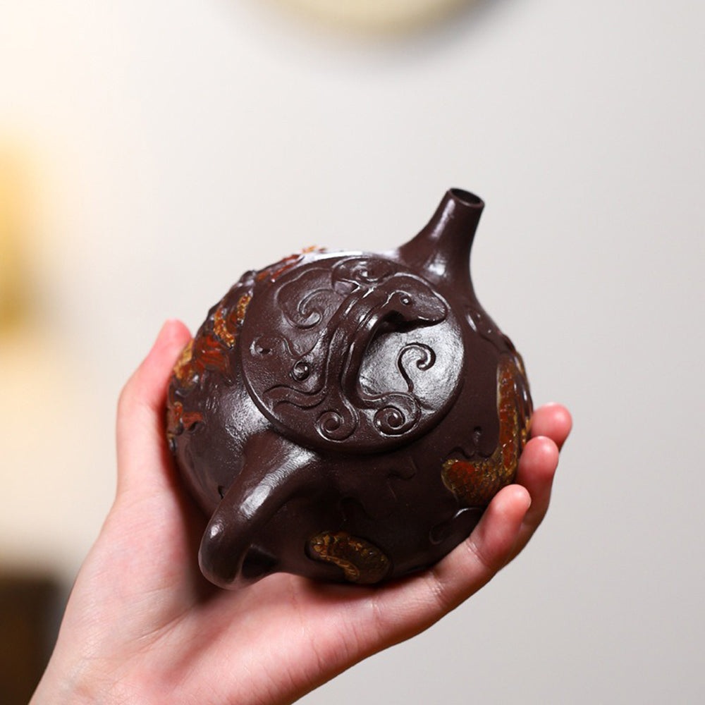 Close-up of the majestic dragon design on the Shipiao teapot, emphasizing its artistic craftsmanship.