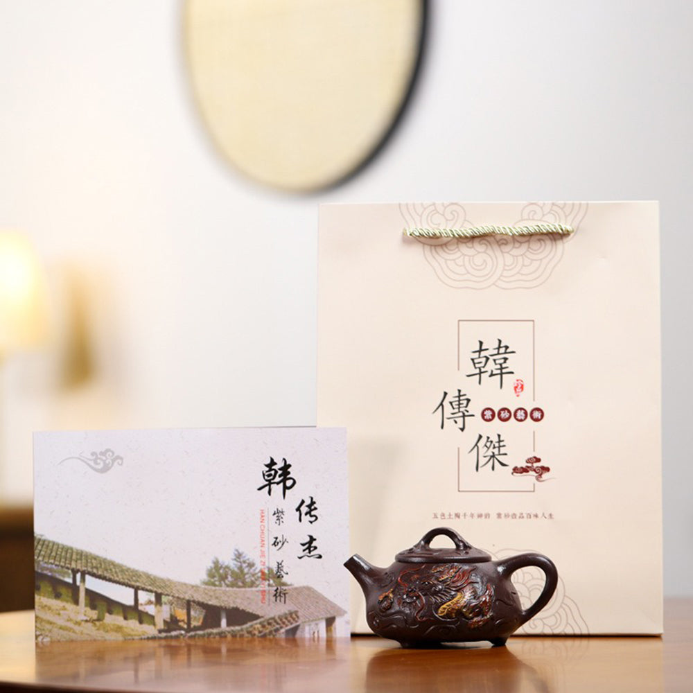 Close-up of the majestic dragon design on the Shipiao teapot, emphasizing its artistic craftsmanship.