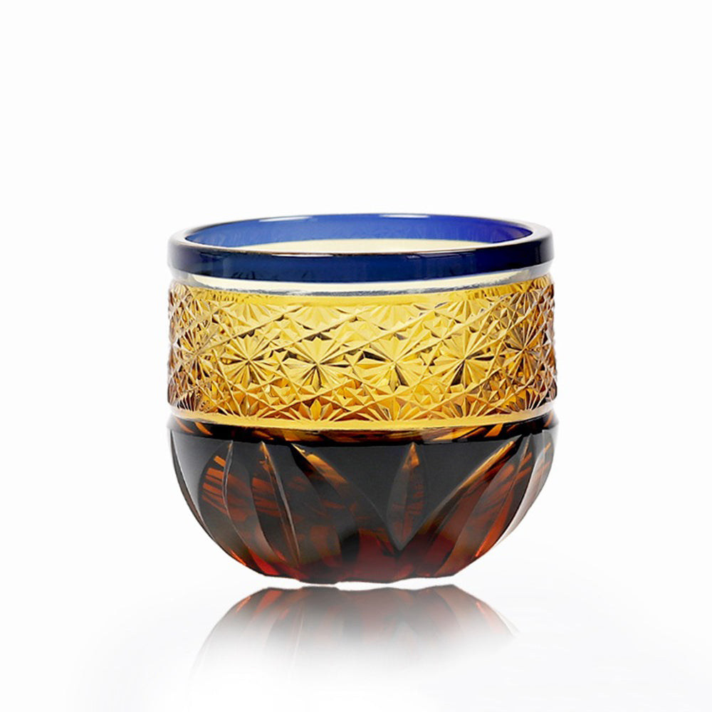 Handcrafted Japanese Edo Kiriko glass used for whiskey or tea, showcasing traditional carving and layered design