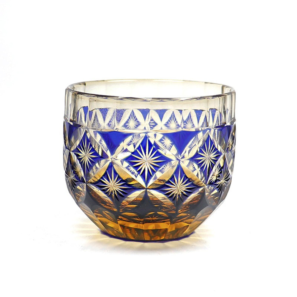 Handcrafted Japanese Edo Kiriko glass used for whiskey or tea, showcasing traditional carving and layered design
