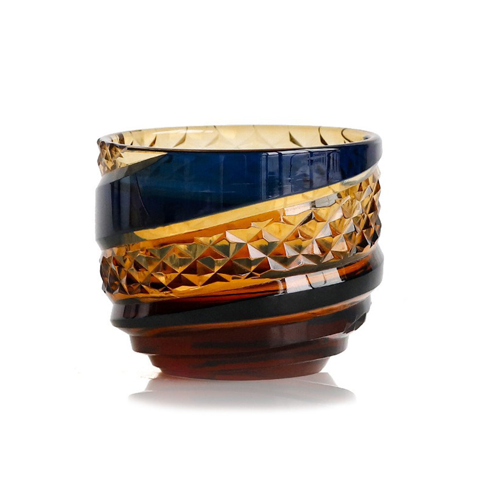Edo Kiriko amber blue chrysanthemum whiskey glass with geometric patterns and vibrant colors
