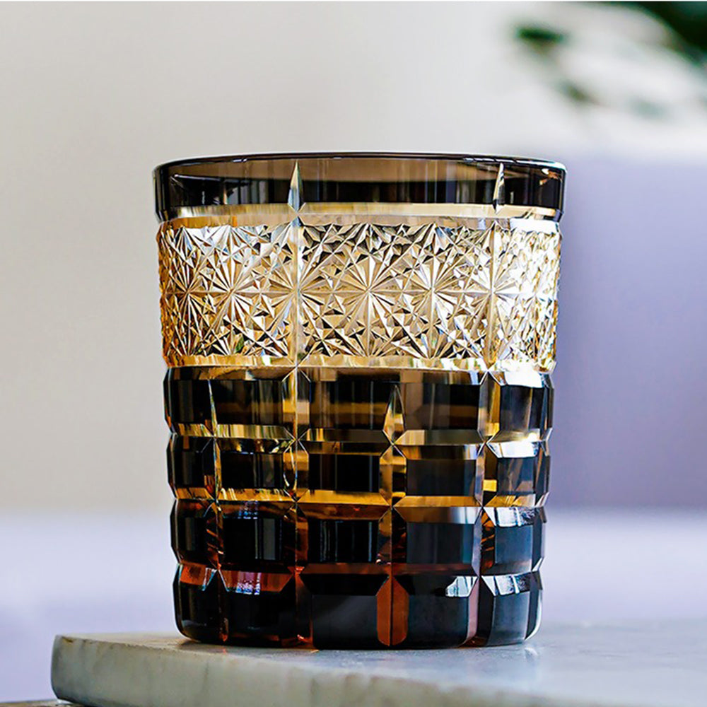 Close-up view of the handcrafted glass highlighting the diamond cuts reflecting light.