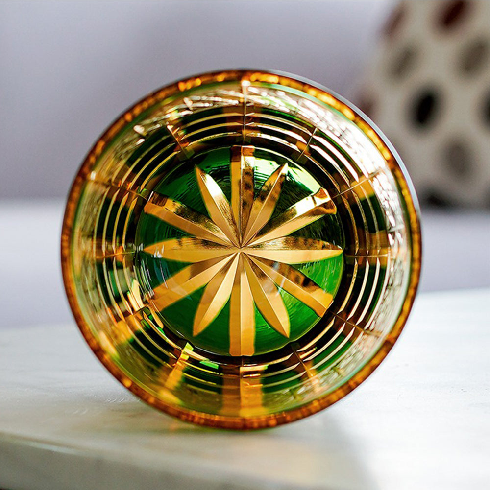 Close-up view of the handcrafted glass highlighting the diamond cuts reflecting light.