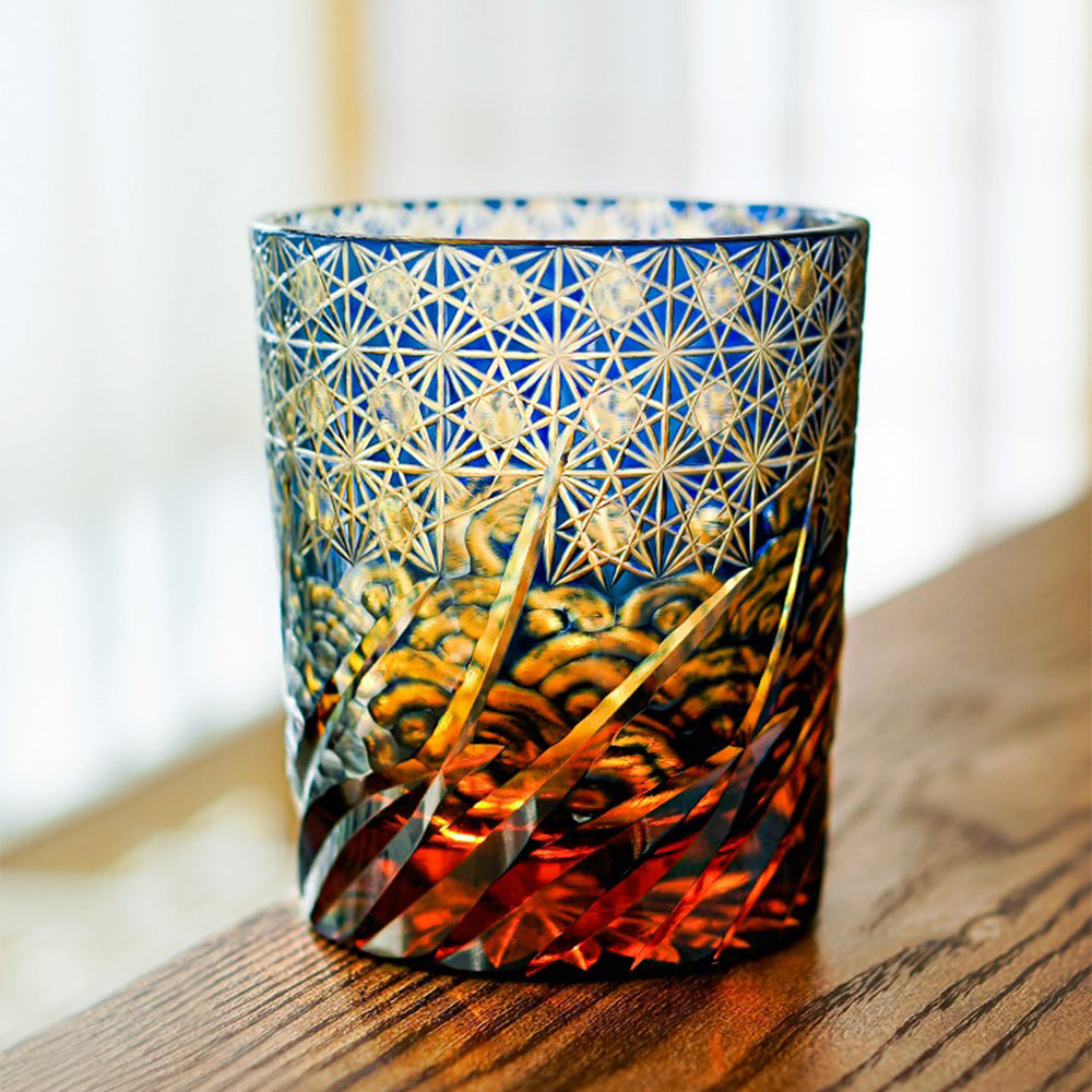 Close-up of the handcrafted Edo Kiriko blue whiskey glass with wave pattern