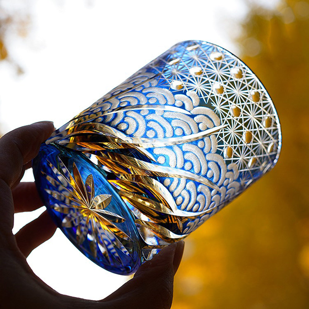 Close-up of the handcrafted Edo Kiriko blue whiskey glass with wave pattern