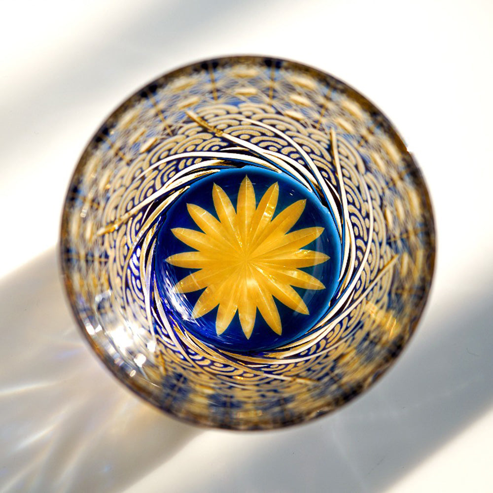The whiskey glass placed on a wooden table, demonstrating its elegance and craftsmanship