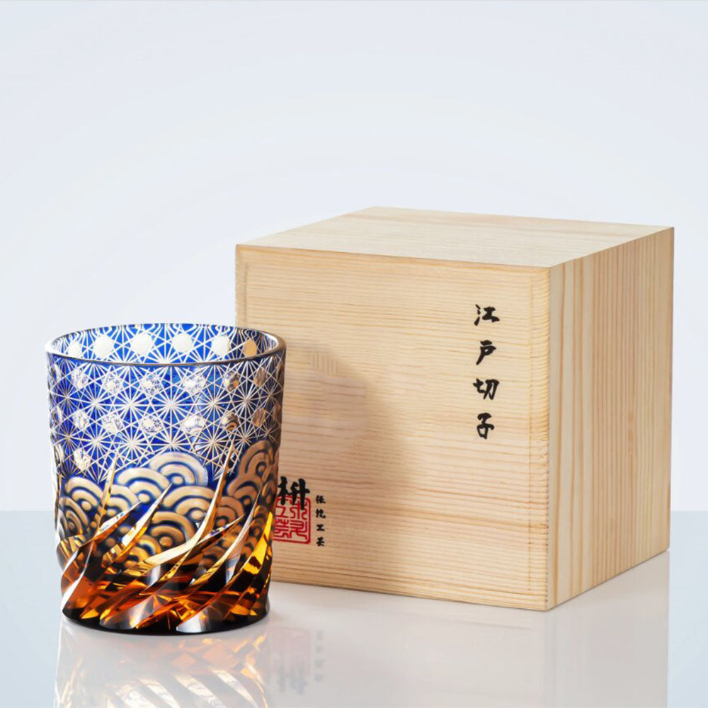 Close-up of the handcrafted Edo Kiriko blue whiskey glass with wave pattern