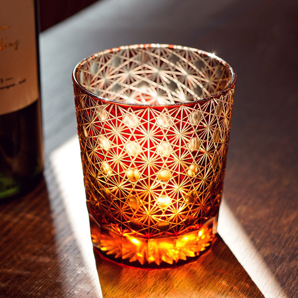 Handcrafted Japanese glass for whiskey lovers, featuring layered amber tones and detailed patterns.
