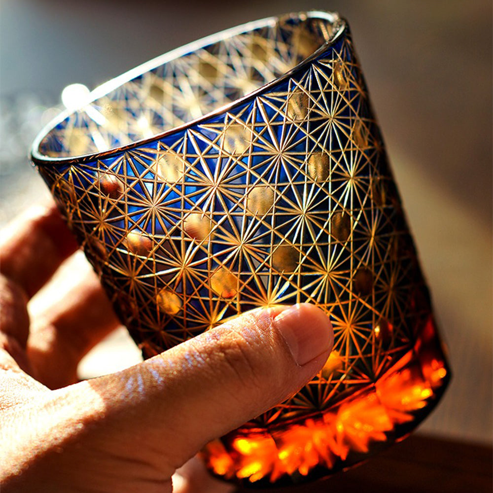 Close-up of the smooth rim and intricate designs of a traditional Edo Kiriko glass, perfect for high-end barware.