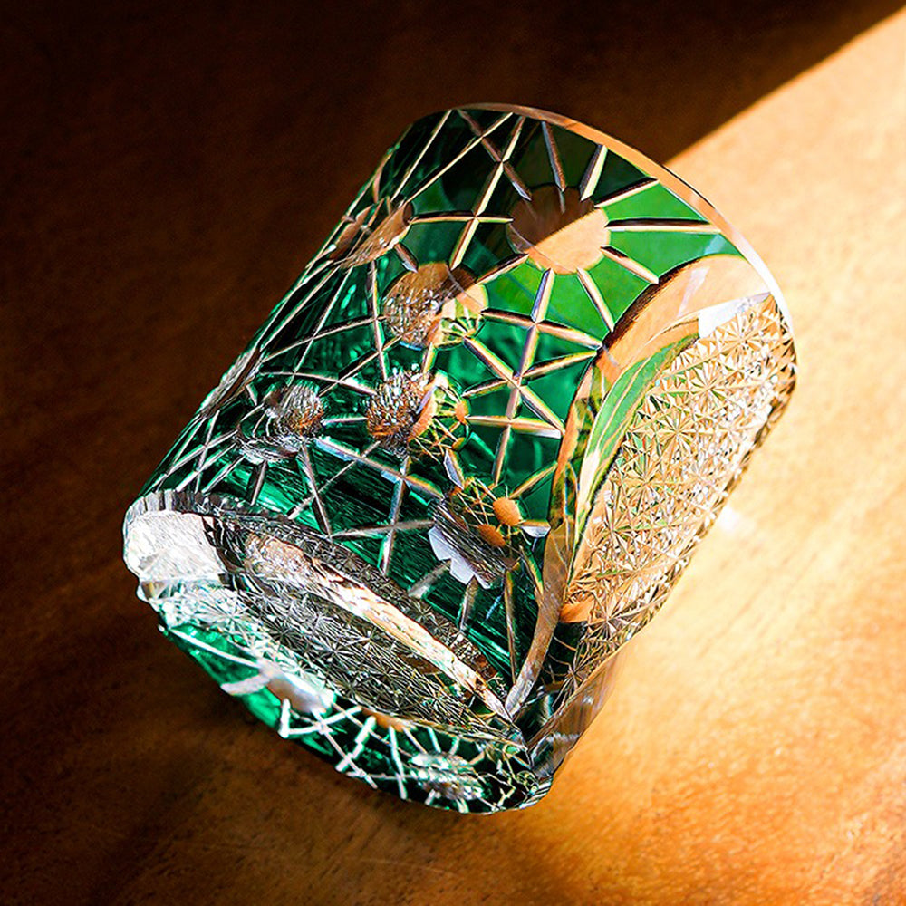Close-up of the textured, handcrafted crystal whiskey glass highlighting the star-inspired pattern and clarity