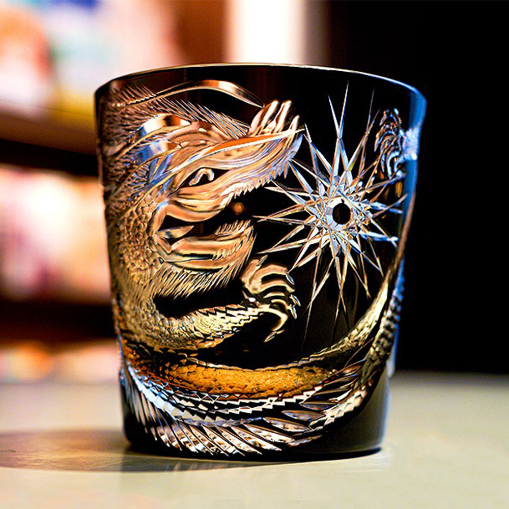 Edo Kiriko dragon whiskey glass with intricate carvings and light reflections, ideal for whiskey tasting.