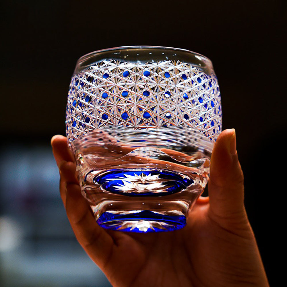 Elegant blue Edo Kiriko glass with shimmering star and chrysanthemum design