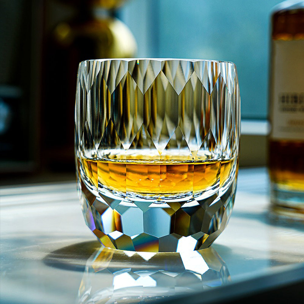 Edo Kiriko handcrafted diamond cut whiskey glass reflecting rainbow light