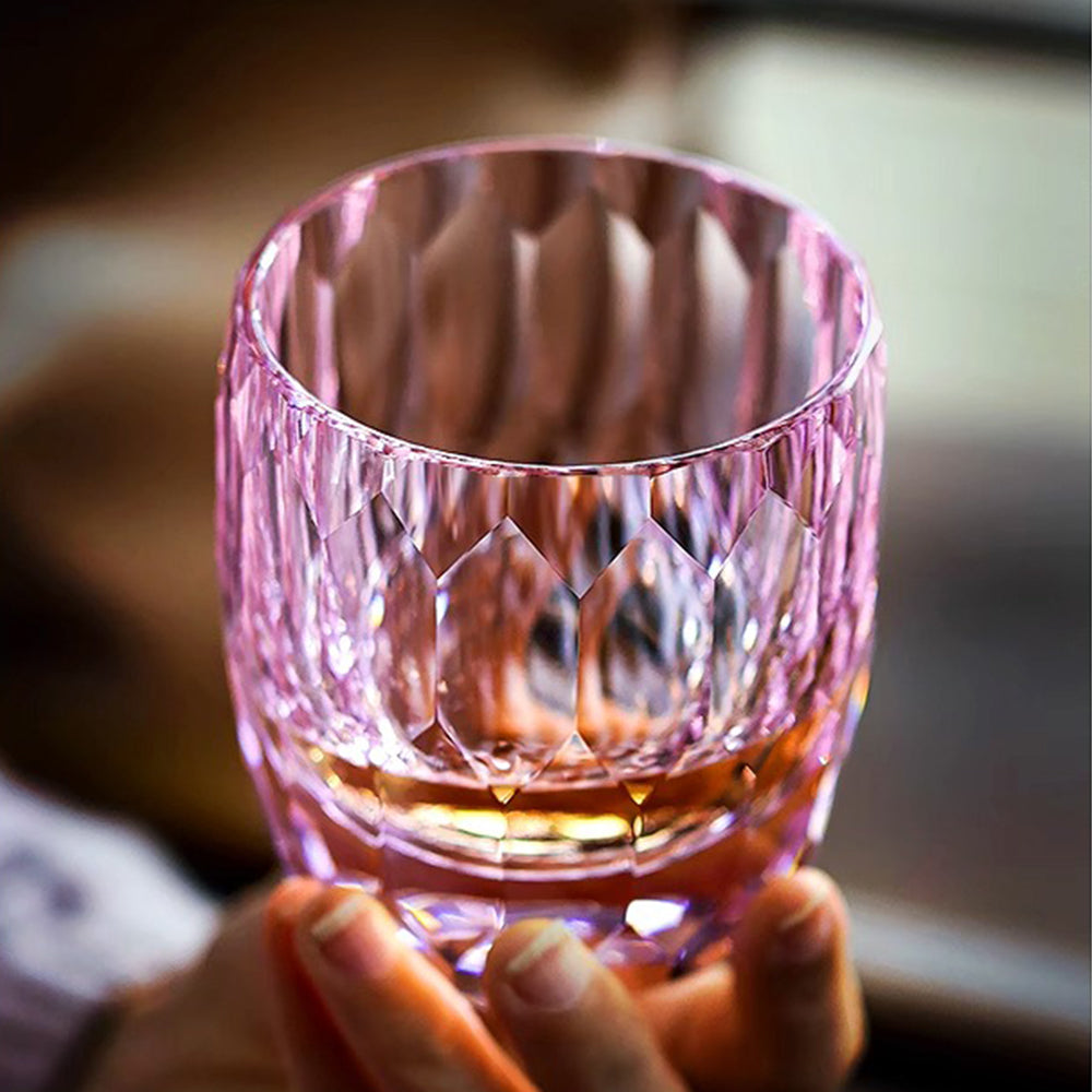 Edo Kiriko handcrafted diamond cut whiskey glass reflecting rainbow light