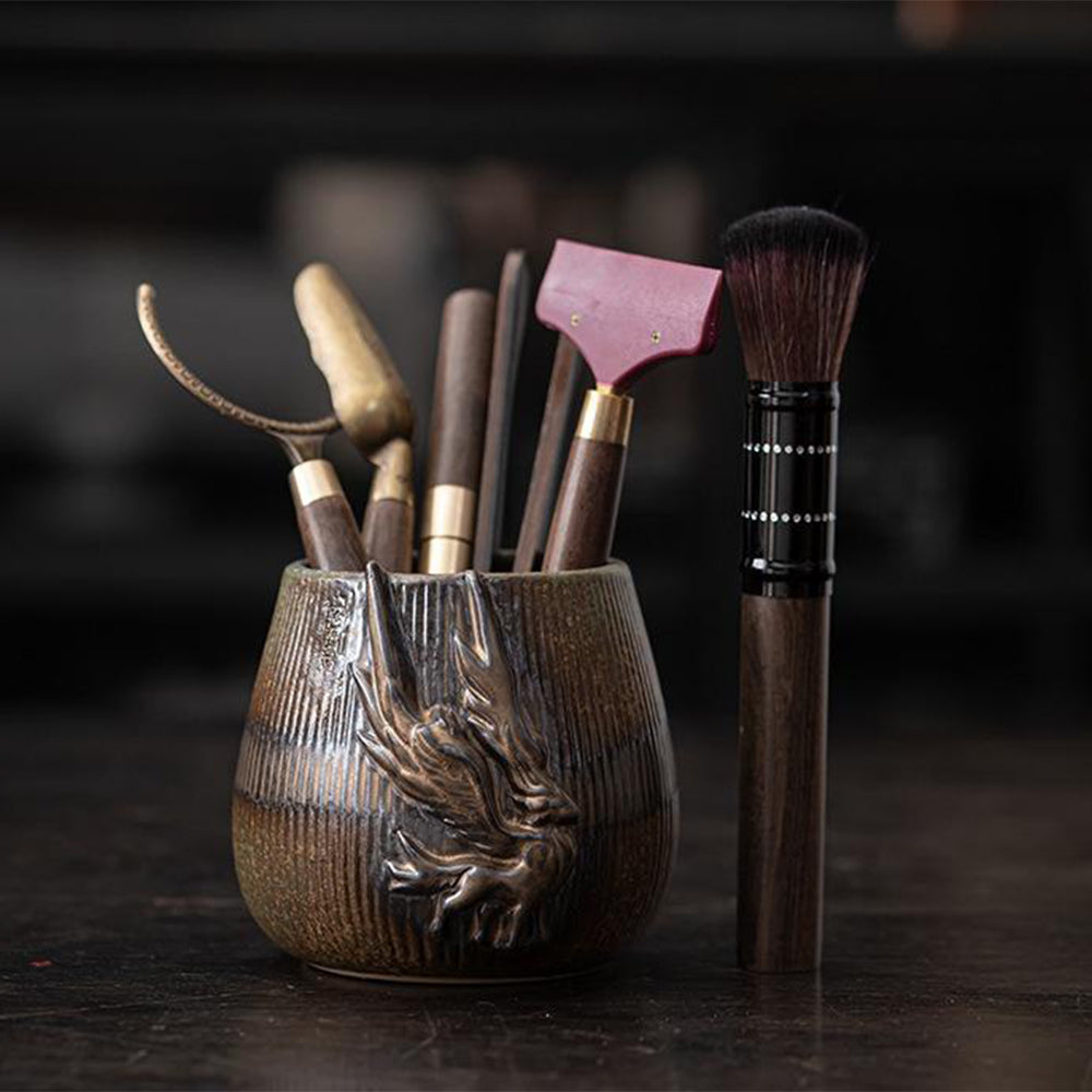 Close-up view of the ebony tea utensils set showcasing the bronze glaze holder.