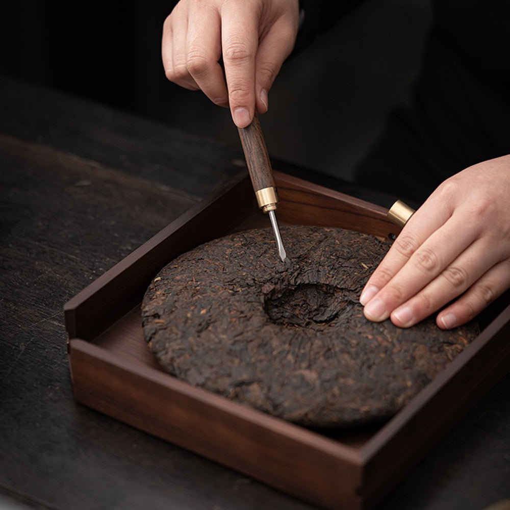 Complete tea accessories set displayed elegantly on a wooden table.