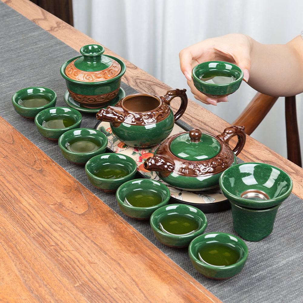 Close-up of the dragon tea tray highlighting the artistic design and the automatic induction cooker integrated into the set.