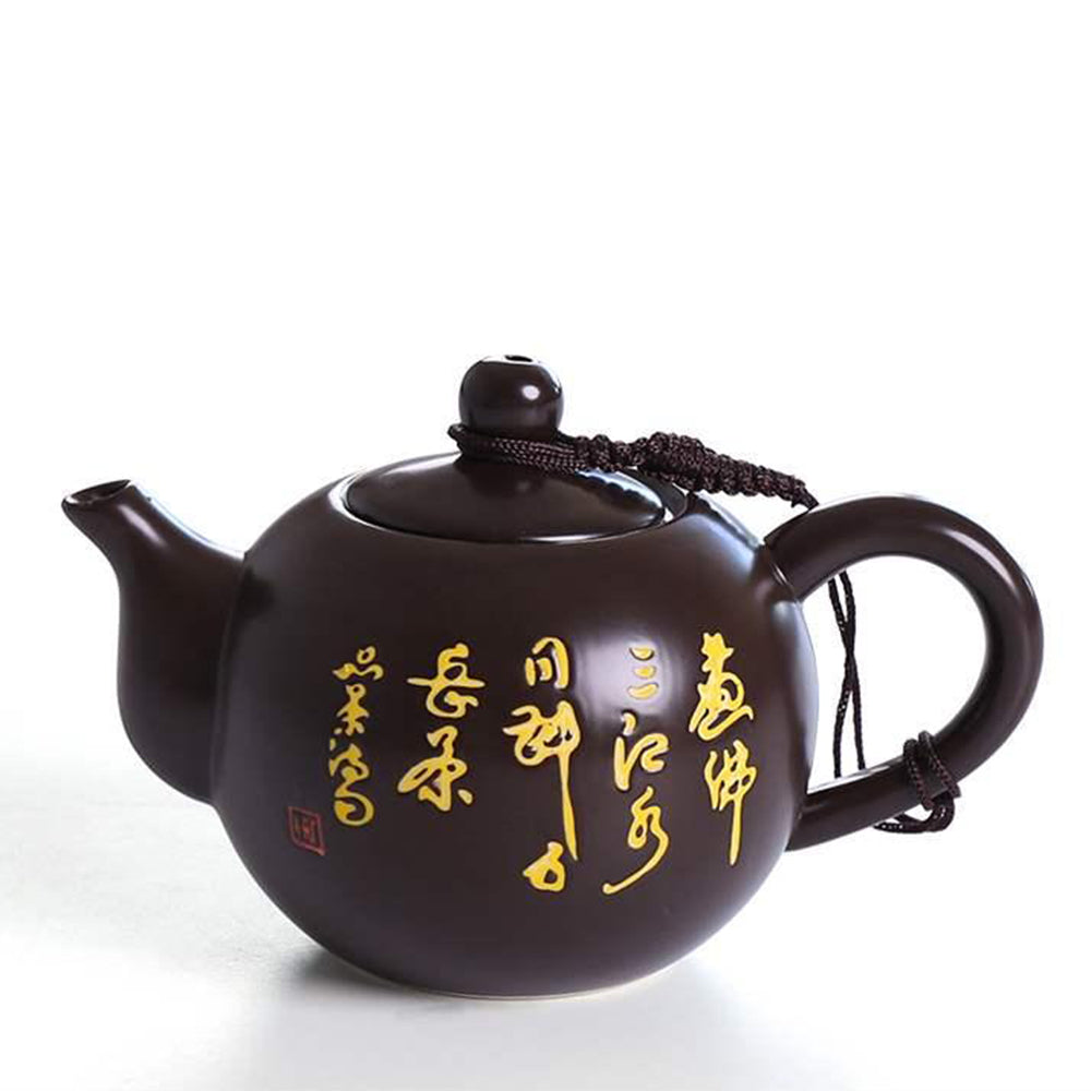 Complete tea set arrangement including teapot, cups, and accessories.