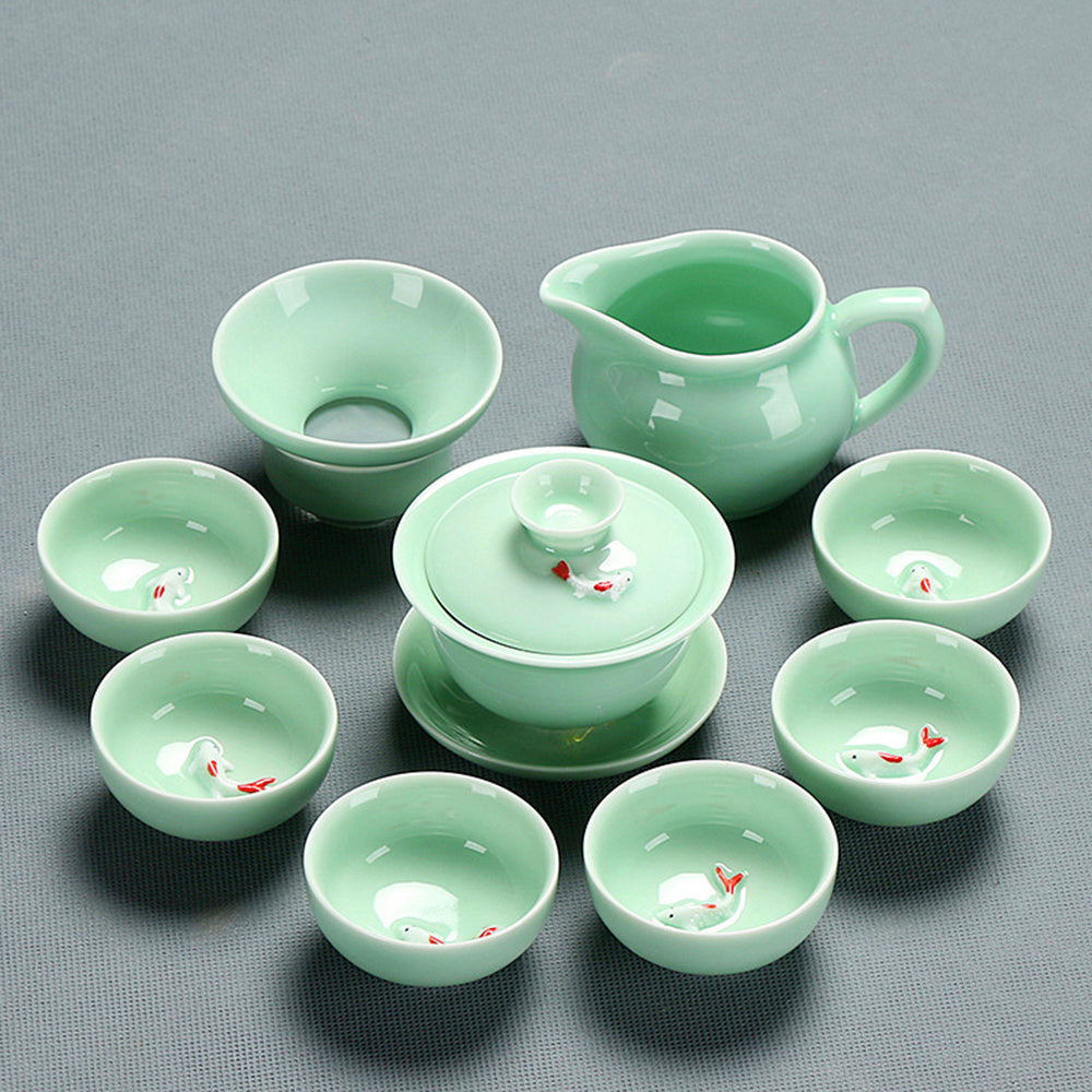 Automatic tea brewing set with electric heater and porcelain teapot on a stylish tea tray