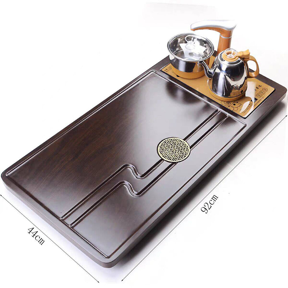 Image of the complete tea brewing set on a wooden tray, highlighting its elegant design and functionality.