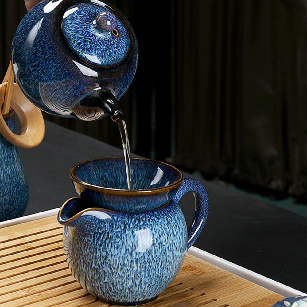 Image of the complete tea brewing set on a wooden tray, highlighting its elegant design and functionality.