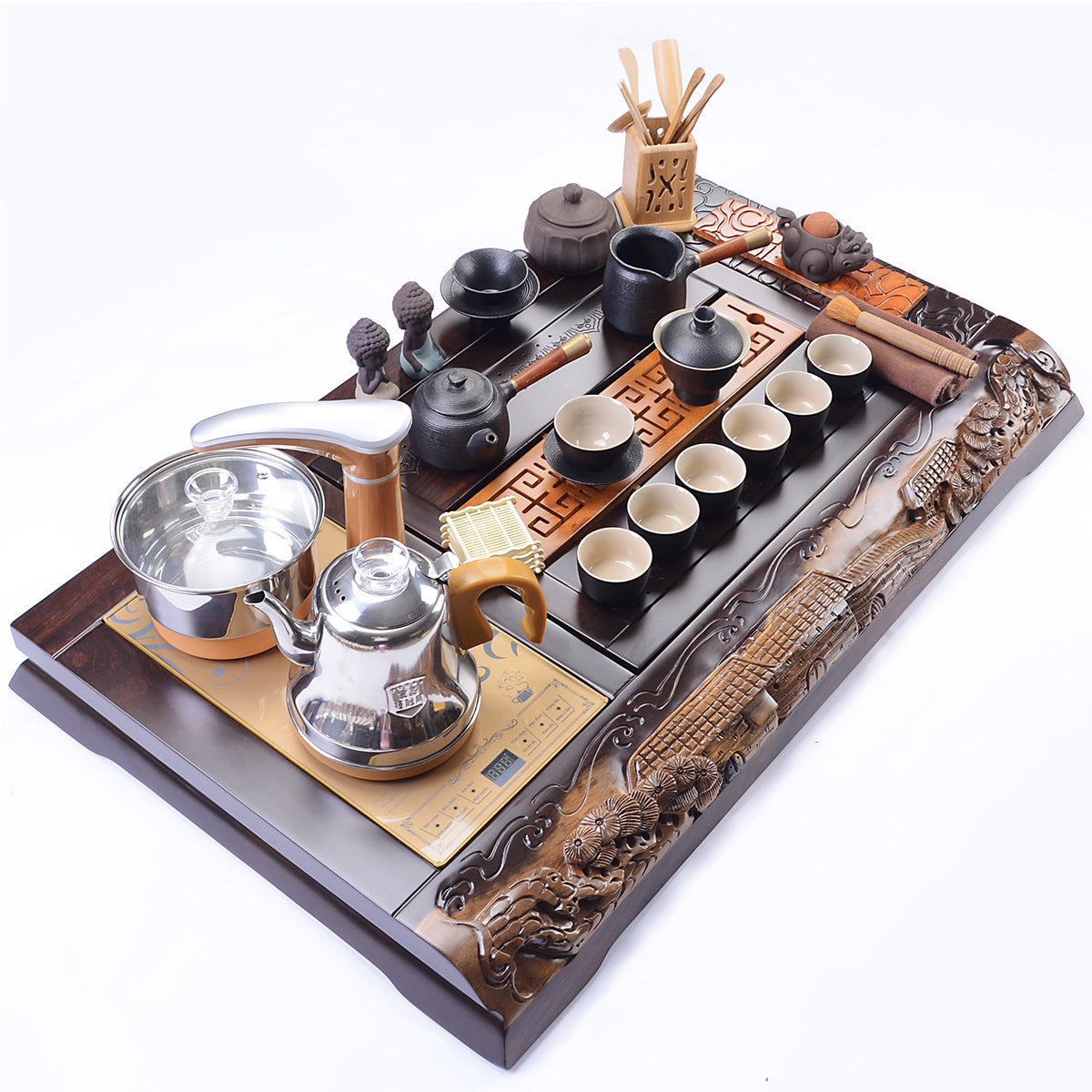 Elegant black pottery kung fu tea set with ebony tray showcasing intricate carvings.