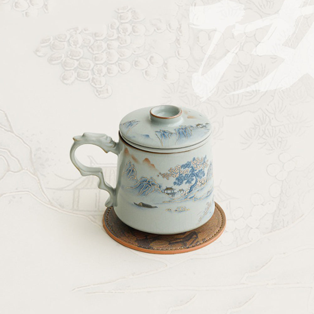 The tea cup with infuser and gift box, showcasing its exquisite craftsmanship and traditional Chinese design