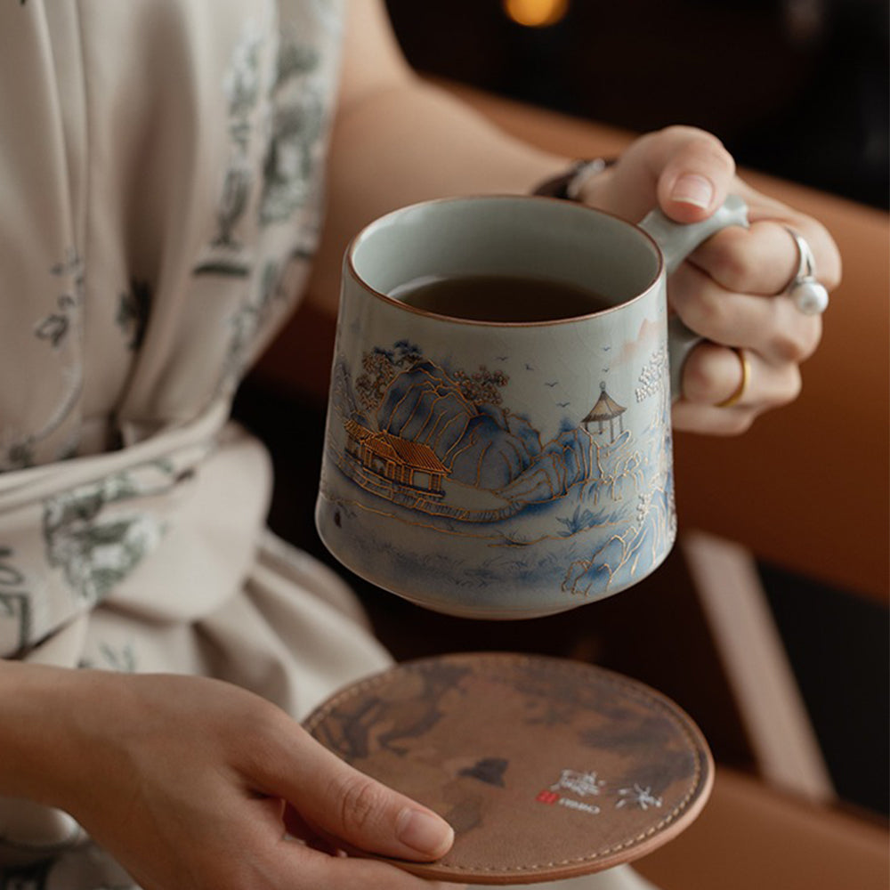 Side view of the porcelain tea cup with a comfortable ergonomic handle and fitting lid, ideal for Chinese tea lovers
