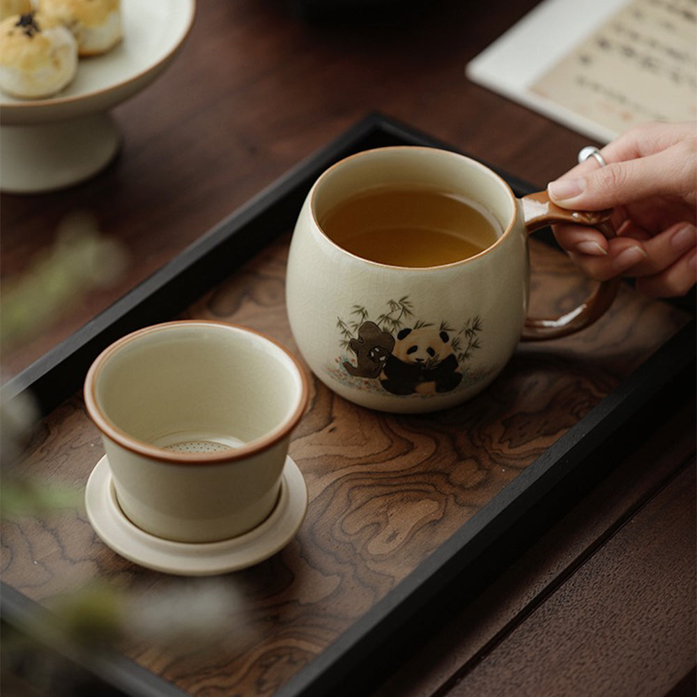Ruyao panda tea cup with infuser showcasing its delicate crackle texture and lid.